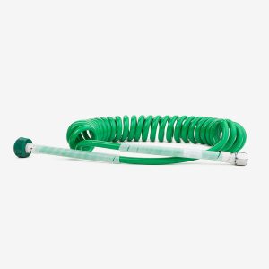 Green coiled medical oxygen hose on white background